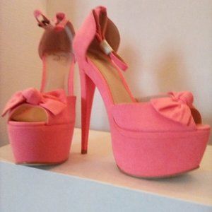 Bow tie pink platform slingbacks. Size 7.5.